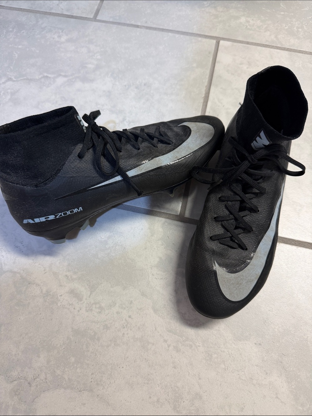 Nike Black and Silver High-Top Soccer Cleats